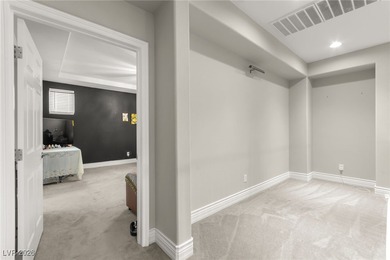 This beautifully renovated two-story home offers five bedrooms on Rhodes Ranch Golf Club in Nevada - for sale on GolfHomes.com, golf home, golf lot