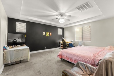 This beautifully renovated two-story home offers five bedrooms on Rhodes Ranch Golf Club in Nevada - for sale on GolfHomes.com, golf home, golf lot