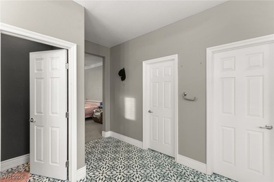 This beautifully renovated two-story home offers five bedrooms on Rhodes Ranch Golf Club in Nevada - for sale on GolfHomes.com, golf home, golf lot