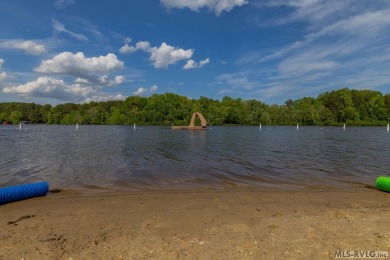 Experience lakefront living at its best in this beautiful on Tanglewood Shores Golf Club in Virginia - for sale on GolfHomes.com, golf home, golf lot