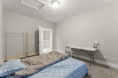 This beautifully renovated two-story home offers five bedrooms on Rhodes Ranch Golf Club in Nevada - for sale on GolfHomes.com, golf home, golf lot