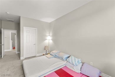 This beautifully renovated two-story home offers five bedrooms on Rhodes Ranch Golf Club in Nevada - for sale on GolfHomes.com, golf home, golf lot