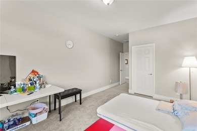 This beautifully renovated two-story home offers five bedrooms on Rhodes Ranch Golf Club in Nevada - for sale on GolfHomes.com, golf home, golf lot