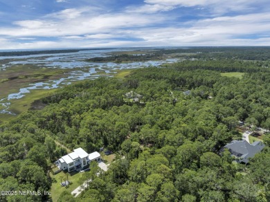 Discover a rare opportunity to own a stunning 1.56-acre homesite on The Palencia Club in Florida - for sale on GolfHomes.com, golf home, golf lot