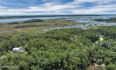 Discover a rare opportunity to own a stunning 1.56-acre homesite on The Palencia Club in Florida - for sale on GolfHomes.com, golf home, golf lot