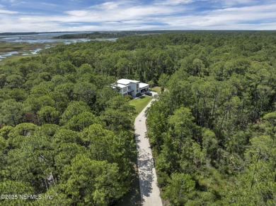Discover a rare opportunity to own a stunning 1.56-acre homesite on The Palencia Club in Florida - for sale on GolfHomes.com, golf home, golf lot