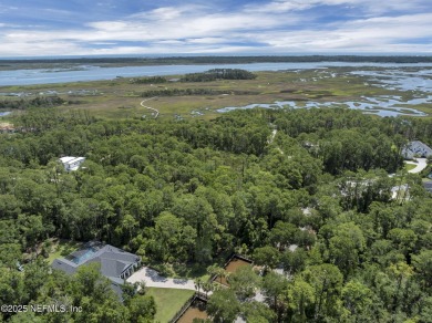 Discover a rare opportunity to own a stunning 1.56-acre homesite on The Palencia Club in Florida - for sale on GolfHomes.com, golf home, golf lot