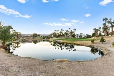 This beautifully renovated two-story home offers five bedrooms on Rhodes Ranch Golf Club in Nevada - for sale on GolfHomes.com, golf home, golf lot