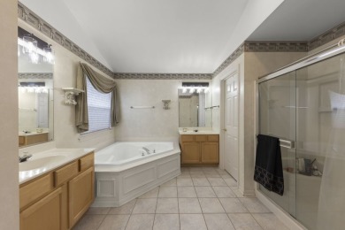 Nestled on one of the most coveted lots in Sterling Oaks, this on Streamwood Oaks Golf Club in Illinois - for sale on GolfHomes.com, golf home, golf lot