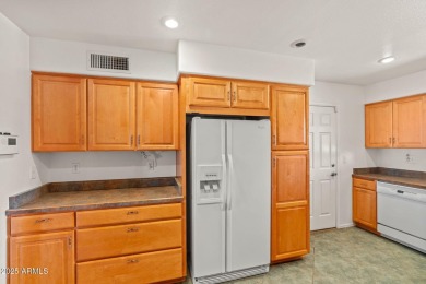 Welcome to this well-maintained 3-bedroom, 2-bathroom home on Sun City Lakes West and East in Arizona - for sale on GolfHomes.com, golf home, golf lot