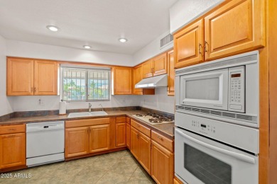 Welcome to this well-maintained 3-bedroom, 2-bathroom home on Sun City Lakes West and East in Arizona - for sale on GolfHomes.com, golf home, golf lot