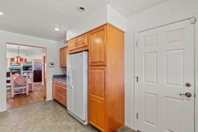 Welcome to this well-maintained 3-bedroom, 2-bathroom home on Sun City Lakes West and East in Arizona - for sale on GolfHomes.com, golf home, golf lot