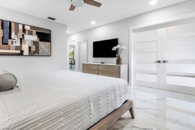 This beautifully renovated 2-bedroom, 2-bath residence In the on Quail Ridge Golf Course and Country Club in Florida - for sale on GolfHomes.com, golf home, golf lot