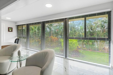 This beautifully renovated 2-bedroom, 2-bath residence In the on Quail Ridge Golf Course and Country Club in Florida - for sale on GolfHomes.com, golf home, golf lot