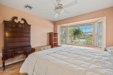 Welcome to this well-maintained 3-bedroom, 2-bathroom home on Sun City Lakes West and East in Arizona - for sale on GolfHomes.com, golf home, golf lot