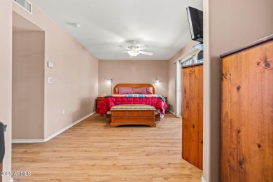 Welcome to this well-maintained 3-bedroom, 2-bathroom home on Sun City Lakes West and East in Arizona - for sale on GolfHomes.com, golf home, golf lot