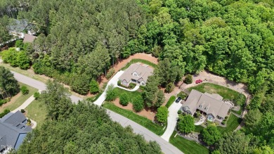 Welcome to an exceptional custom home nestled on nearly an acre on Chapel Ridge Golf Club in North Carolina - for sale on GolfHomes.com, golf home, golf lot
