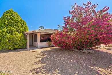 Welcome to this well-maintained 3-bedroom, 2-bathroom home on Sun City Lakes West and East in Arizona - for sale on GolfHomes.com, golf home, golf lot
