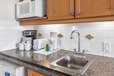 Located in Lasata at Sandestin, this charming ground-floor on Sandestin Golf and Beach Resort - Raven in Florida - for sale on GolfHomes.com, golf home, golf lot