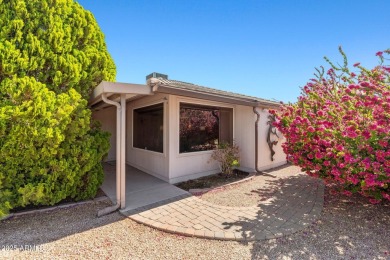 Welcome to this well-maintained 3-bedroom, 2-bathroom home on Sun City Lakes West and East in Arizona - for sale on GolfHomes.com, golf home, golf lot