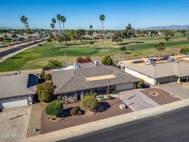 Welcome to this well-maintained 3-bedroom, 2-bathroom home on Sun City Lakes West and East in Arizona - for sale on GolfHomes.com, golf home, golf lot