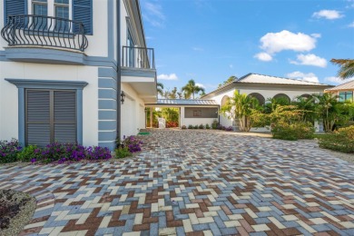 Presenting this stunning Eagle Preserve waterfront home built on on Lemon Bay Golf Club in Florida - for sale on GolfHomes.com, golf home, golf lot