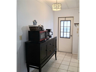 Meticulously maintained home in Barefoot Bay. 2BD/2BA fully on Barefoot Bay Golf Course in Florida - for sale on GolfHomes.com, golf home, golf lot