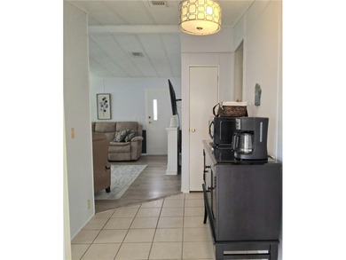 Meticulously maintained home in Barefoot Bay. 2BD/2BA fully on Barefoot Bay Golf Course in Florida - for sale on GolfHomes.com, golf home, golf lot