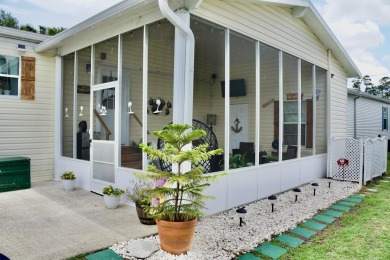 RELAX in this impeccably maintained 2003 Palm Harbor 2 bed/2 on The Club At Pointe West in Florida - for sale on GolfHomes.com, golf home, golf lot