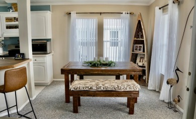 RELAX in this impeccably maintained 2003 Palm Harbor 2 bed/2 on The Club At Pointe West in Florida - for sale on GolfHomes.com, golf home, golf lot