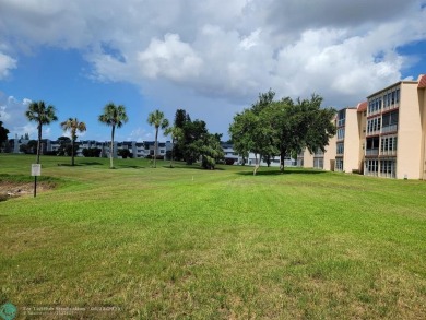 Experience Florida living in this spacious, bright unit located on Oriole Golf and Tennis Club in Florida - for sale on GolfHomes.com, golf home, golf lot
