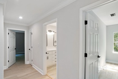 Welcome to 621 Wedgewood Drive! A stunningly renovated residence on The Golf Club of the Wharf in Alabama - for sale on GolfHomes.com, golf home, golf lot