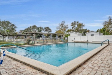 Welcome to this spacious 3 bed 2 bath well maintained home in on Bay Tree Golf Course in Florida - for sale on GolfHomes.com, golf home, golf lot