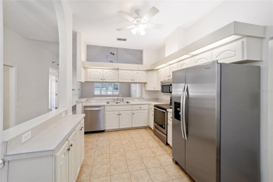 This beautifully maintained 2/2/2, smoke-free, pet-free home is on Royal Oaks Golf Club in Florida - for sale on GolfHomes.com, golf home, golf lot