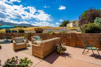 Enjoy golf course living in this charming 2-bed 2-bath home on on Battlement Mesa Golf Course in Colorado - for sale on GolfHomes.com, golf home, golf lot