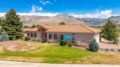 Enjoy golf course living in this charming 2-bed 2-bath home on on Battlement Mesa Golf Course in Colorado - for sale on GolfHomes.com, golf home, golf lot