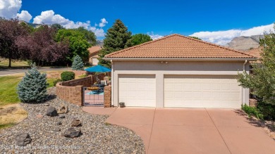 Enjoy golf course living in this charming 2-bed 2-bath home on on Battlement Mesa Golf Course in Colorado - for sale on GolfHomes.com, golf home, golf lot