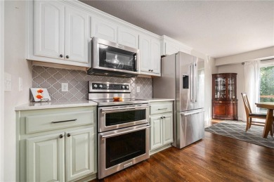 Stunningly Updated Reverse 1.5 Story Backing to Greenspace on Paradise Pointe Golf Complex in Missouri - for sale on GolfHomes.com, golf home, golf lot
