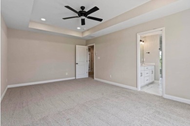 This 4-bedroom, 3.5-bath home offers stunning golf course views on Canewood Golf Course in Kentucky - for sale on GolfHomes.com, golf home, golf lot