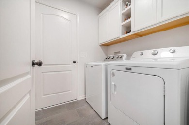 Stunningly Updated Reverse 1.5 Story Backing to Greenspace on Paradise Pointe Golf Complex in Missouri - for sale on GolfHomes.com, golf home, golf lot