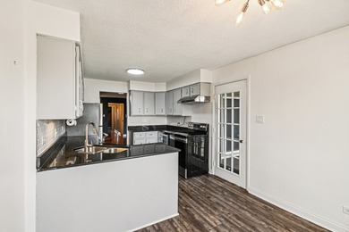 Welcome home to this well-maintained 2-bedroom, 2-bath condo in on Oak Hills Country Club in Illinois - for sale on GolfHomes.com, golf home, golf lot