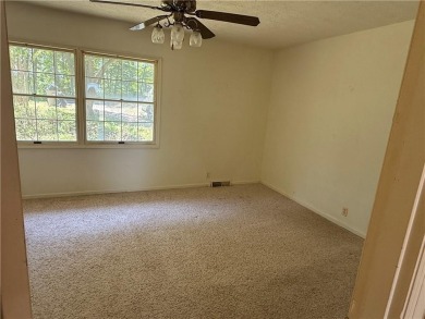 Lake View Home with Workshop  Great Potential!

This 3-bedroom on Holiday Island Executive Golf Course in Arkansas - for sale on GolfHomes.com, golf home, golf lot