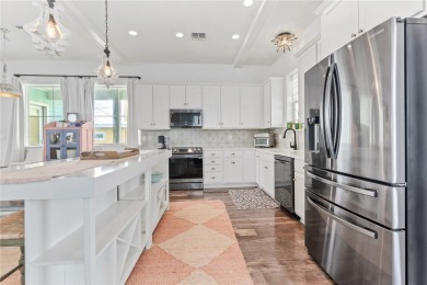 Welcome to 203 Royal Dunes Cir--a beautifully refreshed coastal on Palmilla Beach Golf Club in Texas - for sale on GolfHomes.com, golf home, golf lot