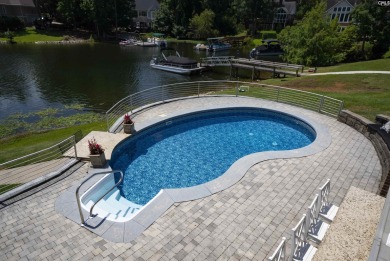 Welcome to 216 Dawn Island Trail, an elegant executive home with on Timberlake Country Club in South Carolina - for sale on GolfHomes.com, golf home, golf lot