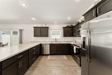 Beautiful 3-bed, 2-bath Charlotte Courtyard Villas with a VIEW! on Pennbrooke Fairways in Florida - for sale on GolfHomes.com, golf home, golf lot