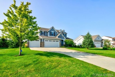 Location, location, location!  This wonderful home is located in on The Macatwa Legends Golf Course in Michigan - for sale on GolfHomes.com, golf home, golf lot