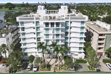 Exclusive boutique waterfront building with only 25 units on Indian Creek Country Club in Florida - for sale on GolfHomes.com, golf home, golf lot