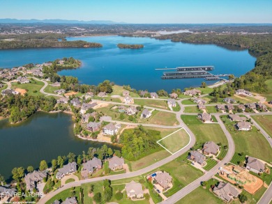 Seize the rare opportunity to own a large, .56-acre corner lot on Wind River Golf Course in Tennessee - for sale on GolfHomes.com, golf home, golf lot