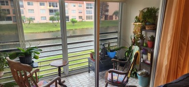 Updated 2 bed 2 bath in Sunrise Lakes Solid Wood Cherry Shaker on Sunrise Lakes Phase III in Florida - for sale on GolfHomes.com, golf home, golf lot