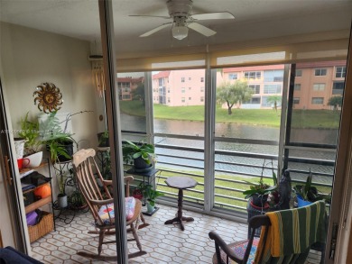 Updated 2 bed 2 bath in Sunrise Lakes Solid Wood Cherry Shaker on Sunrise Lakes Phase III in Florida - for sale on GolfHomes.com, golf home, golf lot